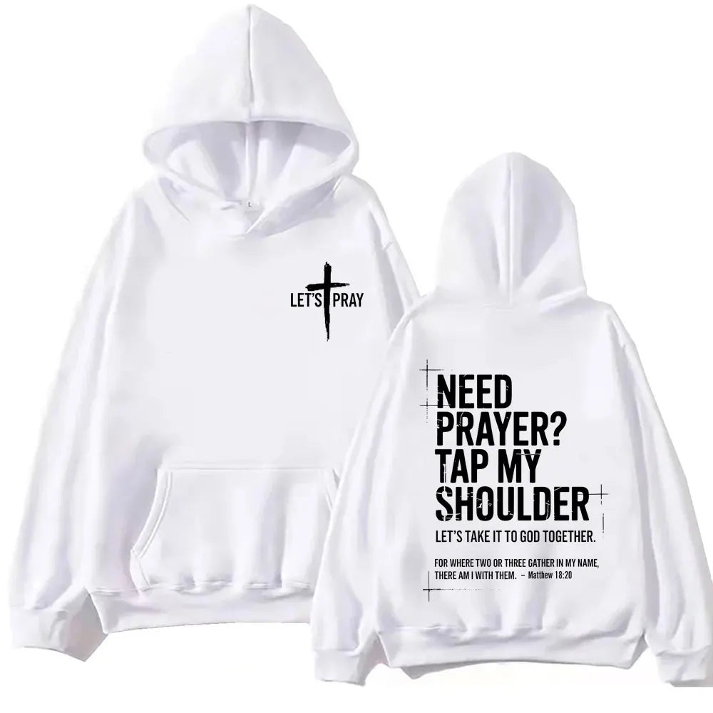 White pullover hoodie shown from both front and back on a plain white background. The front has a small black cross graphic with the words 'LET'S PRAY' on the chest.