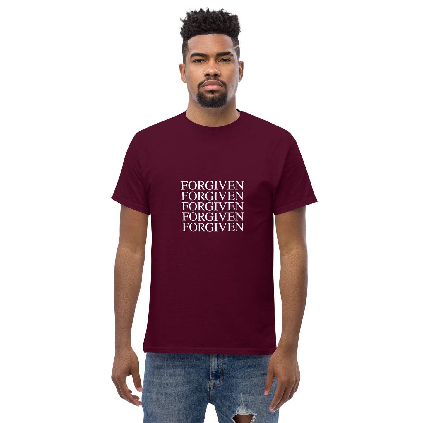 Man wearing a maroon t-shirt with 'FORGIVEN' text