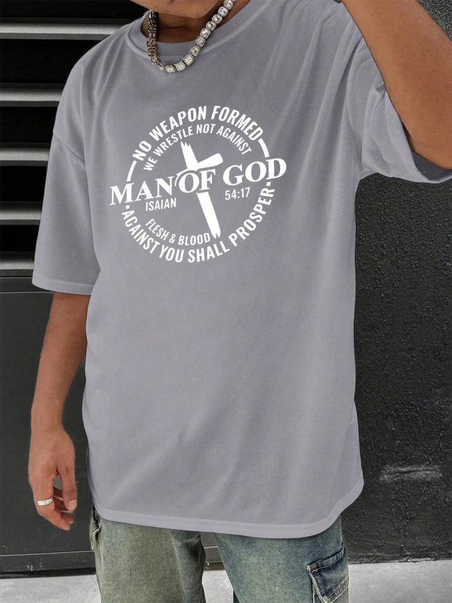 Person wearing a gray t-shirt with a religious design and text.