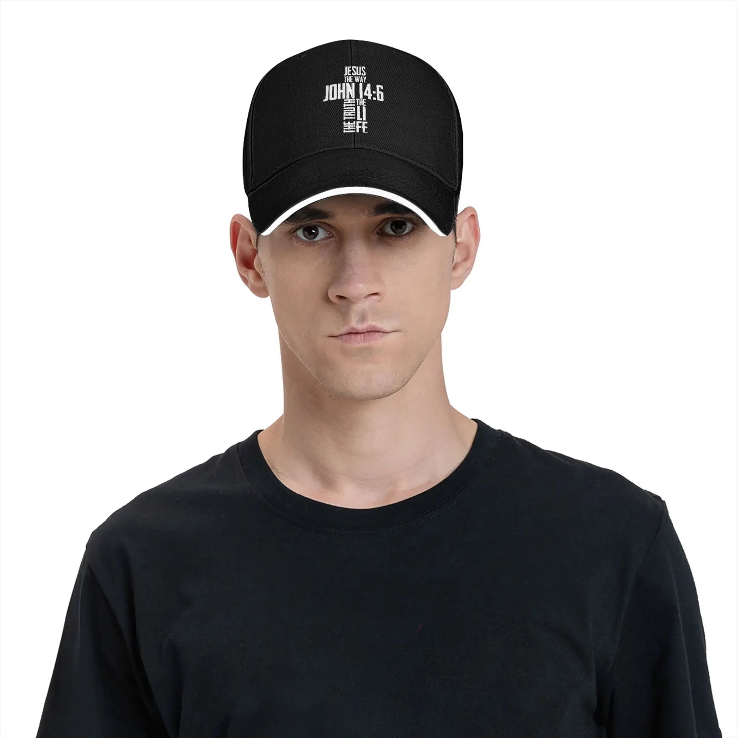 Man wearing a black cap with a logo on a white background