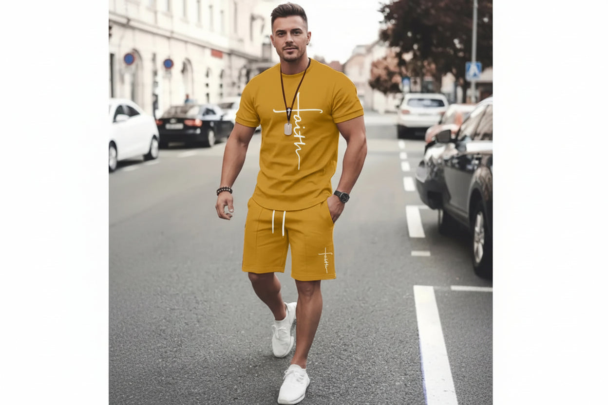 Man wearing a mustard yellow outfit with 'faith' text on a street.
