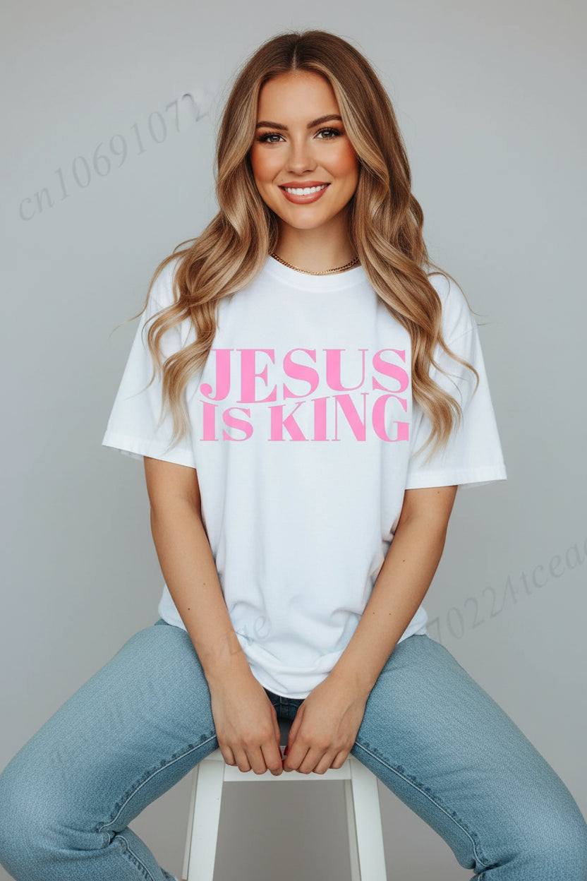 White t-shirt with 'Jesus is King' printed on the front and back, featuring a biblical verse.
