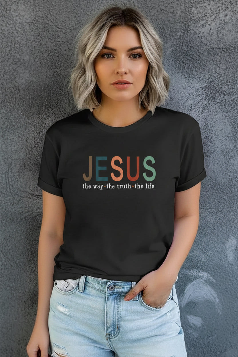 Person wearing a black t-shirt with 'JESUS the way the truth the life' text.