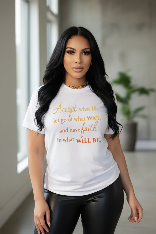 Person wearing a white t-shirt with a motivational quote