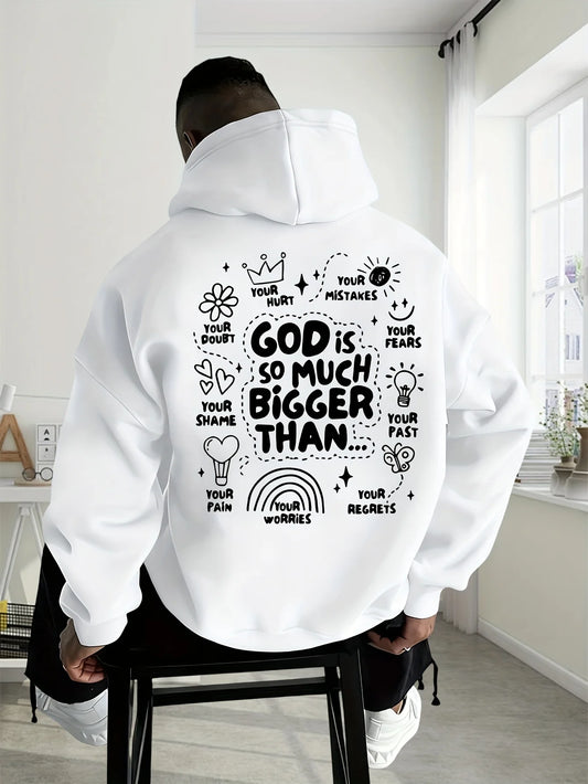A man wearing a white hoodie from the back, seated on a black stool in a bright room. The hoodie features a large black hand-drawn style graphic with motivational text and doodles on the back.