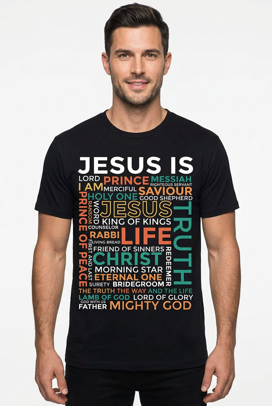 A black short-sleeve crewneck t-shirt featuring a colorful typographic graphic on the front with religious text and words like 'Jesus Is', 'Life', 'Truth', and 'Prince'.