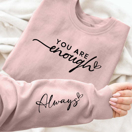 Pink sweatshirt with motivational text 